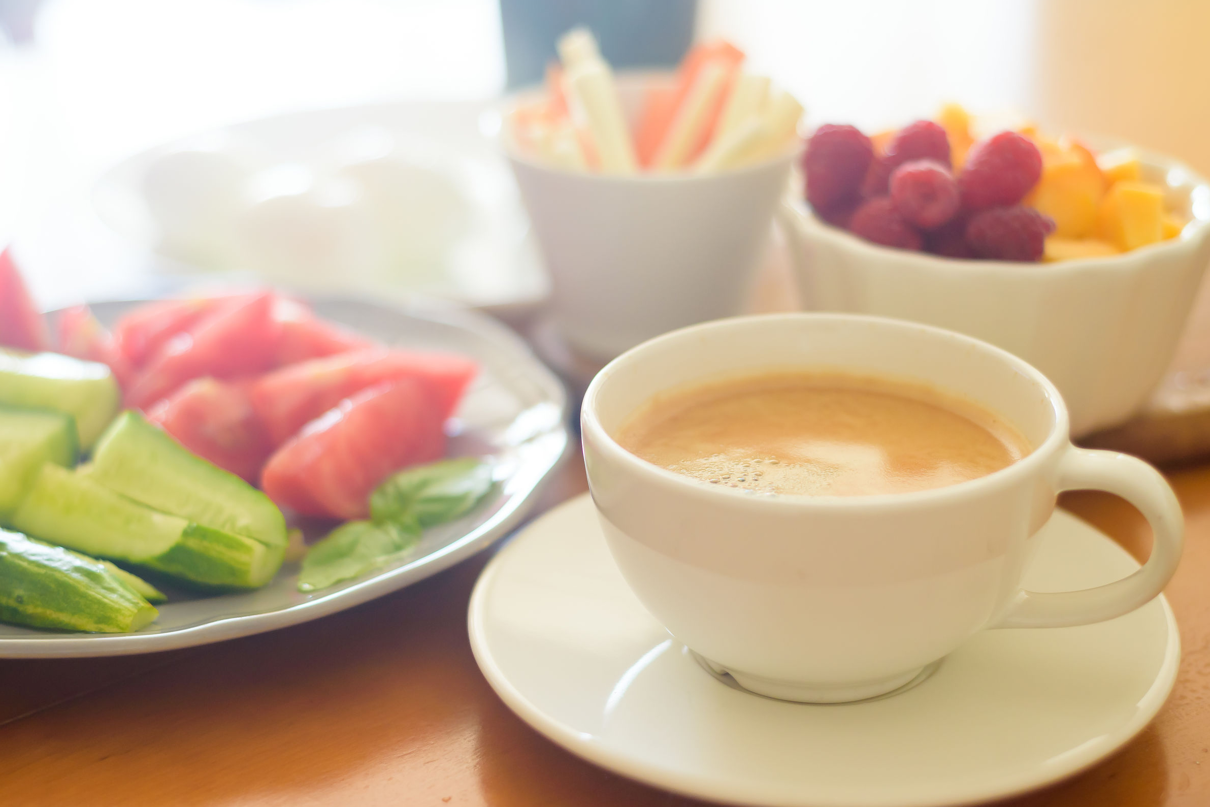 Breakfast with coffee, vegetables and fruits